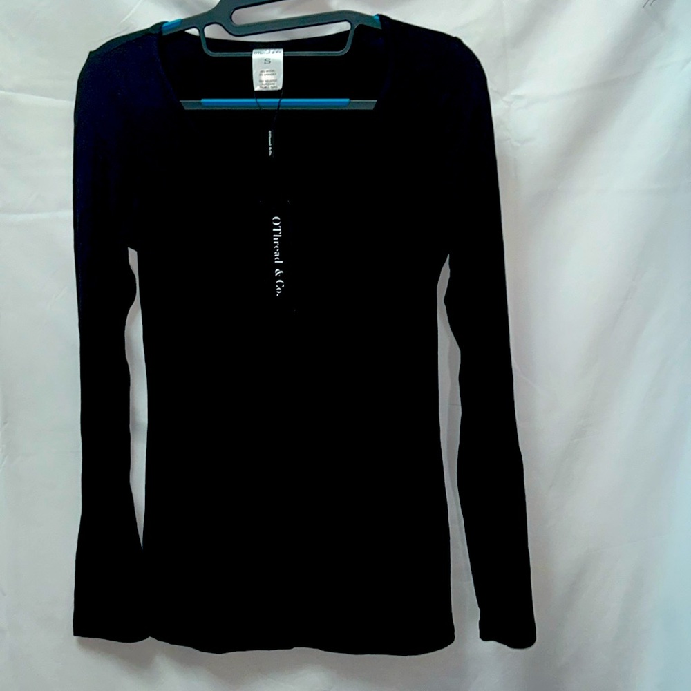 Brand new with tags size, small long sleeve T-shirt, scoop neck